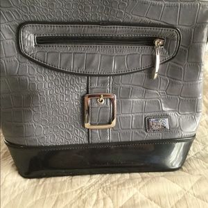 Beijo Couture faux patent leather bag.